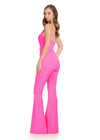 Back - Chic and sophisticated strapless scuba jumpsuit featuring a perfectly tailored fit, an asymmetrical bustier, and a sleek belt for a polished and modern look. Perfect for making a statement at any event.