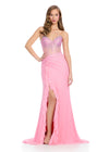 A must-have gown featuring a fully stoned sweetheart neckline, structured corset bustier, and shimmering press-on stones cascading down the skirt. Finished with a right leg slit and ruffle detail for an elegant and glamorous touch. Perfect for special occasions.