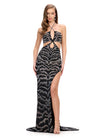 Glamorous halter gown featuring bold cut-outs, dazzling press-on stone beading in an animal-inspired pattern, and a left leg slit. Finished with a sweep train for a showstopping entrance. Perfect for special occasions.