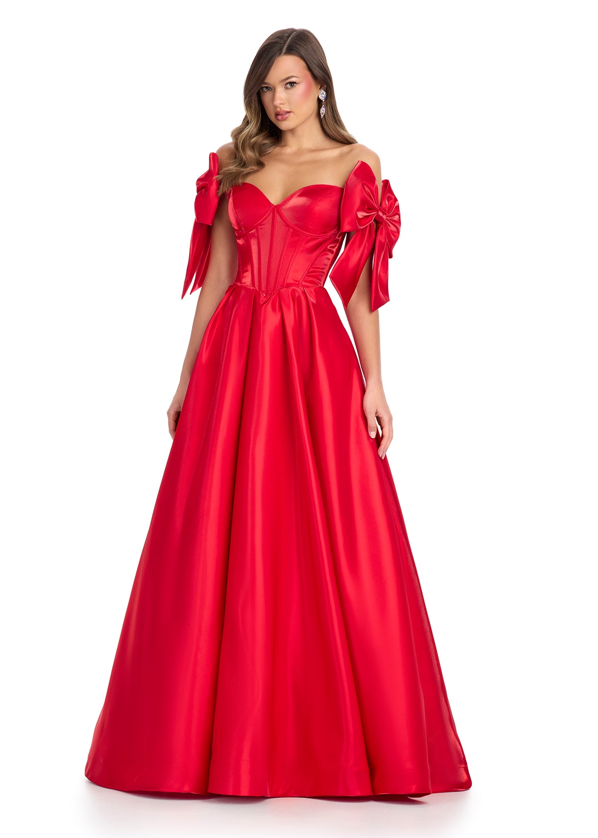 Regal satin ball gown featuring a structured corset bustier, a flattering sweetheart neckline, and elegant off-the-shoulder bow straps. Finished with a voluminous skirt for a timeless princess look. Perfect for special occasions.