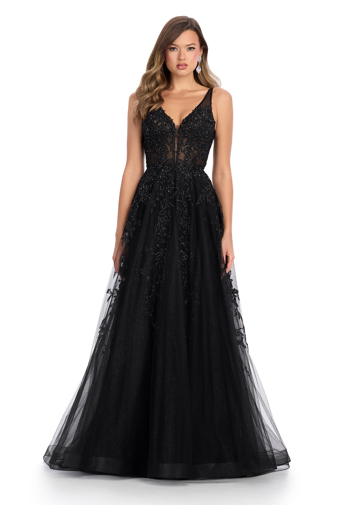 Elegant tulle ball gown featuring a V-neckline, scoop back, and intricate embroidered appliqué adorning the bustier and cascading down the A-line skirt. Finished with a sweep train for a regal touch. Perfect for making a grand entrance.