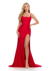 Stunning gown featuring a structured corset bustier, delicate spaghetti straps, and elegant ruching along the skirt. Complete with a wrap skirt and left leg slit for a dramatic and sophisticated look. Perfect for special occasions.