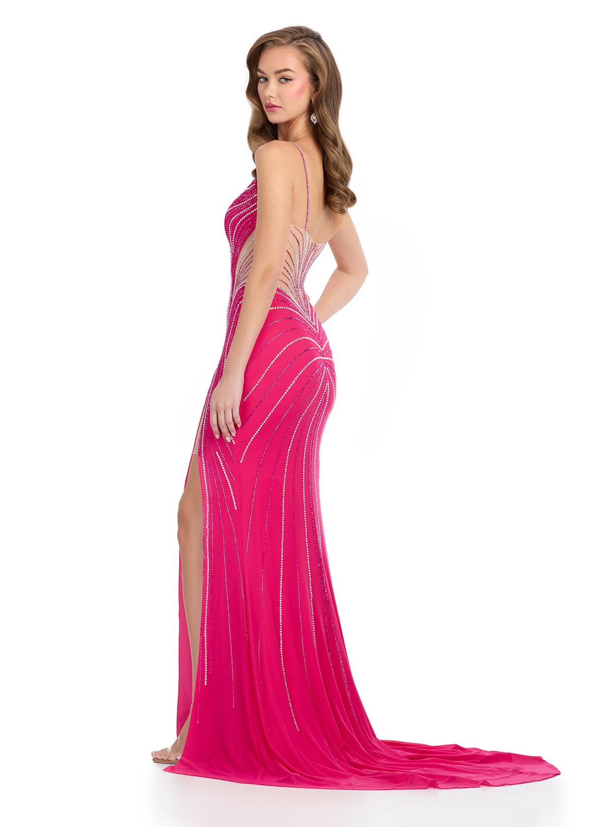 Back - Standout gown featuring dazzling press-on stones, illusion cut-outs strategically placed to accentuate your curves, a sweetheart neckline, a left leg slit, and a sweep train for a glamorous finish. Perfect for special occasions.