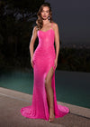 Stunning fully beaded gown featuring a sweetheart neckline, corset bustier, delicate spaghetti straps, a wrap skirt, and a left leg slit for a glamorous and elegant look. Perfect for special occasions.