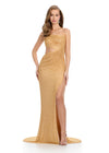 Striking fully beaded one-shoulder gown featuring elegant draping on the bustier, figure-enhancing cut-outs, a left leg slit, and a sweep train for a showstopping entrance. Perfect for special occasions.