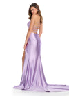 Back. Sleek metallic jersey gown featuring delicate spaghetti straps, a lace-up back, a ruched wrap skirt, and a left leg slit for a shimmering, figure-flattering look. Perfect for any special event.