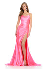 Sleek metallic jersey gown featuring delicate spaghetti straps, a lace-up back, a ruched wrap skirt, and a left leg slit for a shimmering, figure-flattering look. Perfect for any special event.