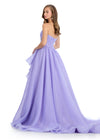 Princess-worthy organza ball gown featuring a sweetheart neckline, intricate beaded details on the bodice and one-shoulder strap, and cascading ruffles that enhance the left leg slit for an elegant and regal look. Perfect for special occasions.