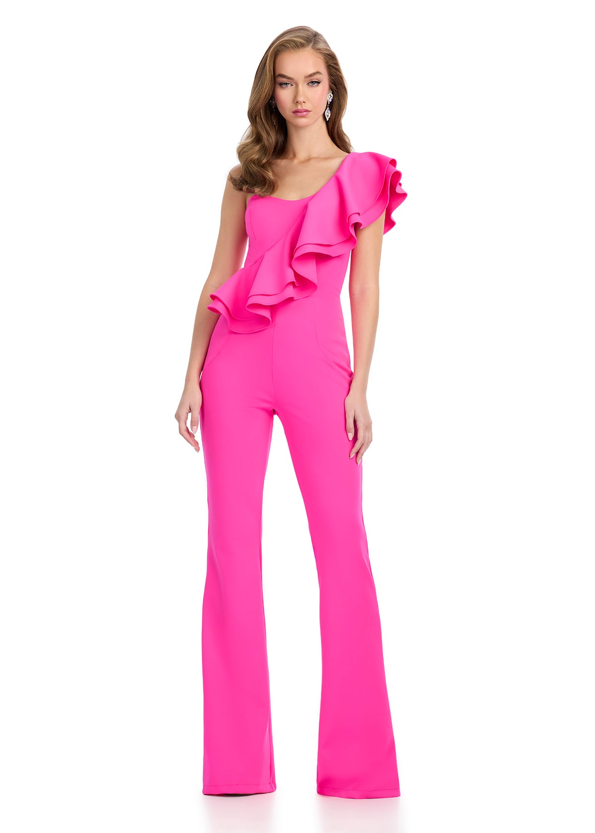 Sleek one-shoulder scuba jumpsuit featuring a dramatic cascading ruffle for the perfect blend of sophistication and bold style. Ideal for making a statement at any event.