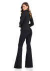 Back - Powerfully chic two-piece scuba jumpsuit featuring a classic blazer-style jacket with a statement bow detail and fit-and-flare pants for the ultimate boss babe look. Perfect for bold and stylish occasions.