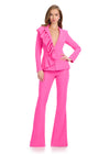 Statement two-piece jersey jumpsuit featuring a ruffle-adorned V-neckline and sleek flare pants for a bold and sophisticated look. Perfect for making an entrance at any event.
