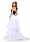Back - Elegant ball gown featuring a velvet bodice with a sweetheart neckline, an asymmetrical drop waist, a fully beaded bow accent, and a multi-tiered satin skirt for a timeless black and white moment. Perfect for special occasions.