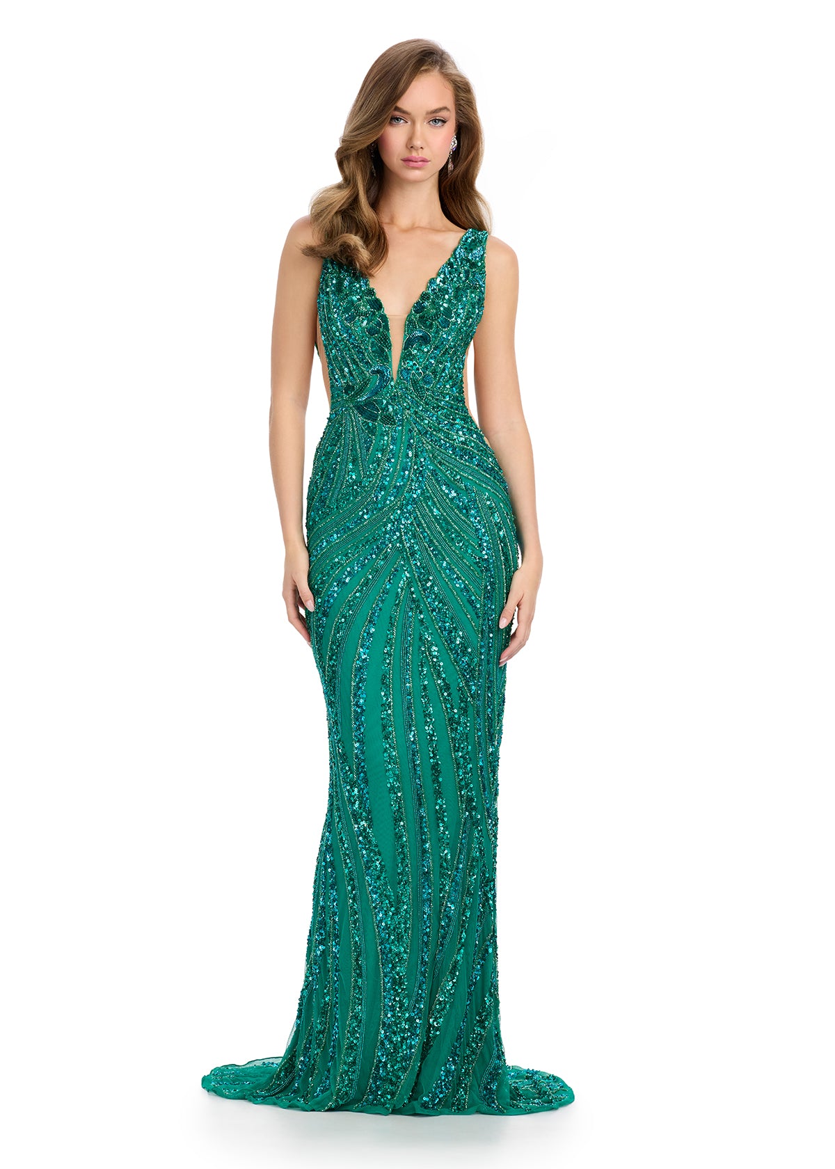 xquisite fully beaded gown featuring a captivating V-neckline, illusion cut-out mesh sides, and a fitted skirt for a modern and elegant statement. Perfect for special occasions.