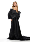 Statement-making off-shoulder cape featuring an oversized bow and flowing overskirt. The perfect accessory to elevate your prom or pageant look with elegance and drama.