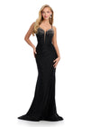 Statement-making jersey gown featuring a corset bustier, illusion V-neckline, asymmetrical waist, and shimmering press-on stones. Finished with a lace-up back for a perfect fit. Ideal for prom and special occasions.