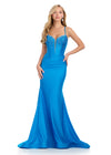 Statement-making jersey gown featuring a corset bustier, illusion V-neckline, asymmetrical waist, and shimmering press-on stones. Finished with a lace-up back for a perfect fit. Ideal for prom and special occasions.