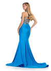 Statement-making jersey gown featuring a corset bustier, illusion V-neckline, asymmetrical waist, and shimmering press-on stones. Finished with a lace-up back for a perfect fit. Ideal for prom and special occasions. Back