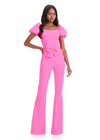 ASHLEYlauren 12089 Jumpsuit | Hot Pink square-neck scuba jumpsuit with voluminous puff sleeves and a cinched waist bow, designed for chic, confident flair.