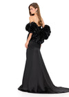 ASHLEYlauren 12185 | Black satin gown with dramatic off shoulder rosette cape, sweetheart neckline, fitted silhouette, and high slit