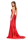 ASHLEYlauren 12285 | Red shimmer jersey gown featuring a plunging V neckline, ruched bodice, lace up open back, and high slit for a sleek dramatic silhouette