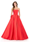 ASHLEYlauren 12358 | Red mikado evening gown with structured bodice, flowing skirt, and dramatic back bow