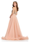 Back - Elevate your look with this stunning layered organza overskirt featuring a structured wire hem and a sweeping train. The perfect statement piece to add flair to any dress, romper, bodysuit, or jumpsuit.