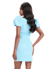 ASHLEYlauren 4955 | Blue dress with puff sleeves and a bow detail on a white background Back