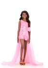 ASHLEYlauren 8326 Romper Gown | Candy Pink kids’ pageant romper gown with high neckline, fully beaded bodice, fringe detailing, and flowing chiffon overskirt for a glamorous, stage-ready look.