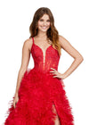 ASHLEYlauren 11446 red tulle gown with ruffled A-line skirt, corset bustier, deep illusion V-neckline, and leg slit