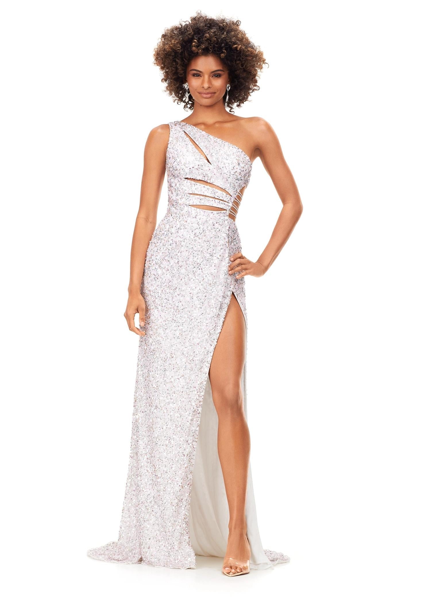 Ab Blush/Ivory ASHLEYlauren 11288 stunning one shoulder fully hand-beaded gown featuring modern cut outs, criss cross waist straps, a left leg slit, and a sweep train for a bold and statement-making entrance.