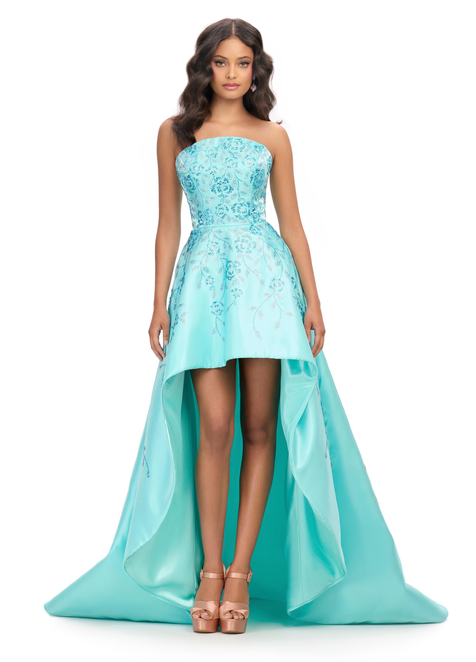 Aqua ASHLEYlauren 11734 elegant satin high-low gown featuring a strapless neckline, floral press-on stone design, and a dramatic silhouette for a modern and glamorous look.