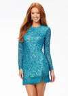 ASHLEYlauren 4438 – A sassy and classy fully hand-beaded long sleeve cocktail dress featuring a fitted skirt with fringe detail along the left leg slit and hemline. Perfect for making a bold, elegant statement at any event.