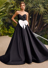 ASHLEYlauren 11770 – A stunning strapless mikado gown featuring a sweetheart neckline, oversized bow detail, and an elegant A-line ball gown skirt. Perfect for making a statement at any special occasion.