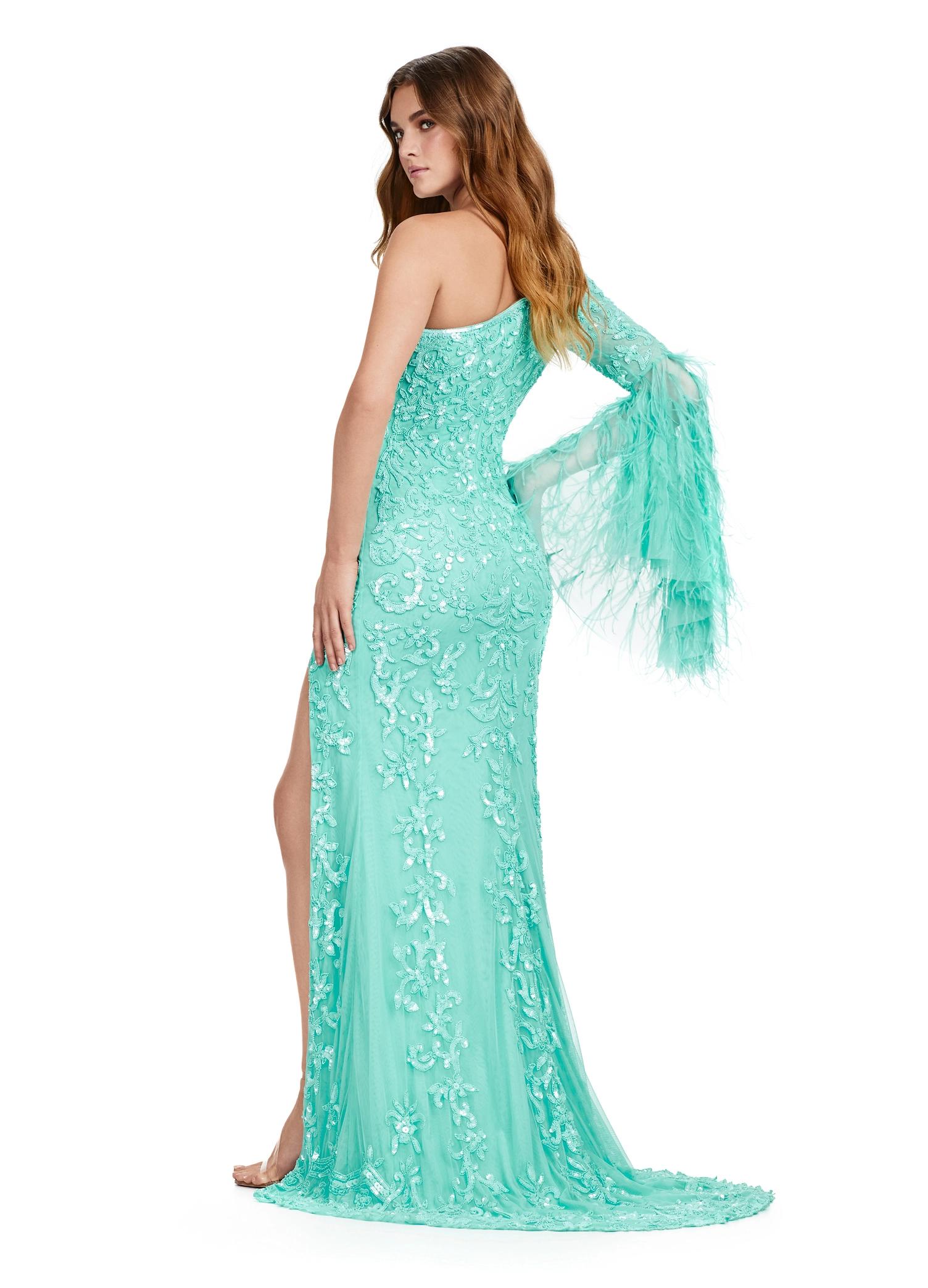 Back. ASHLEYlauren 11452 aqua one shoulder fully beaded gown with feather bell sleeve, left leg slit, and sweep train