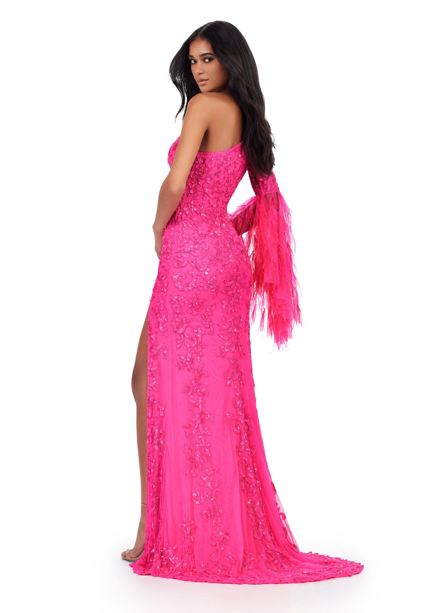 Back. ASHLEYlauren 11452 hot pink one shoulder fully beaded gown with feather bell sleeve, left leg slit, and sweep train