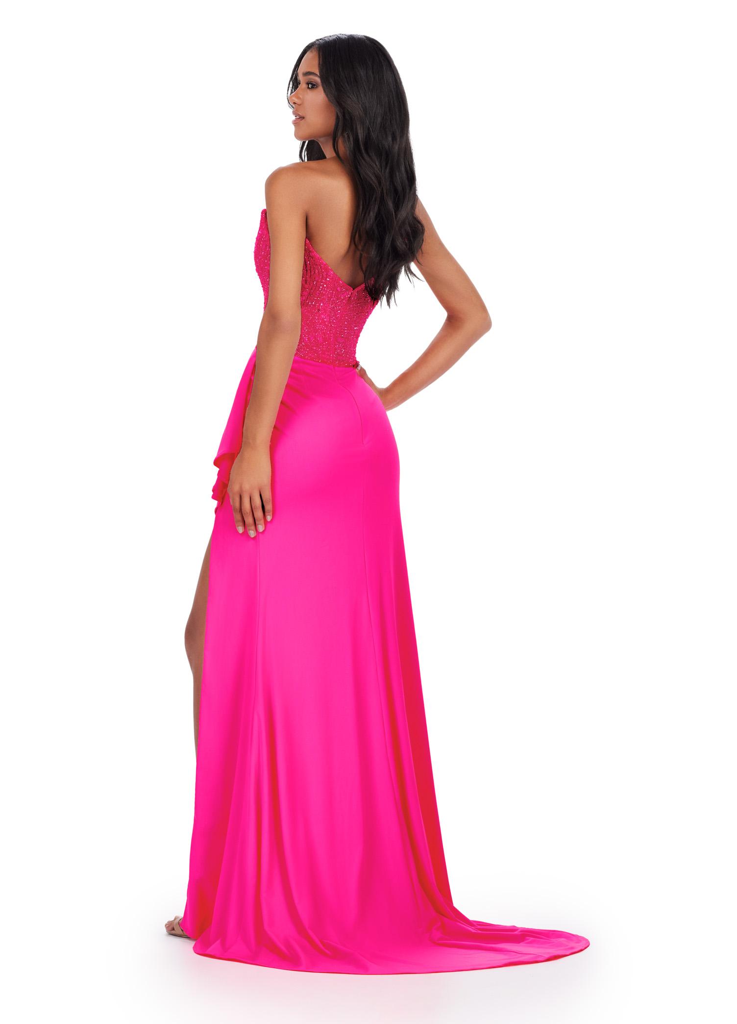 Back. ASHLEYlauren 11454 hot pink one shoulder jersey gown with beaded bodice, ruched wrap skirt, and thigh-high slit