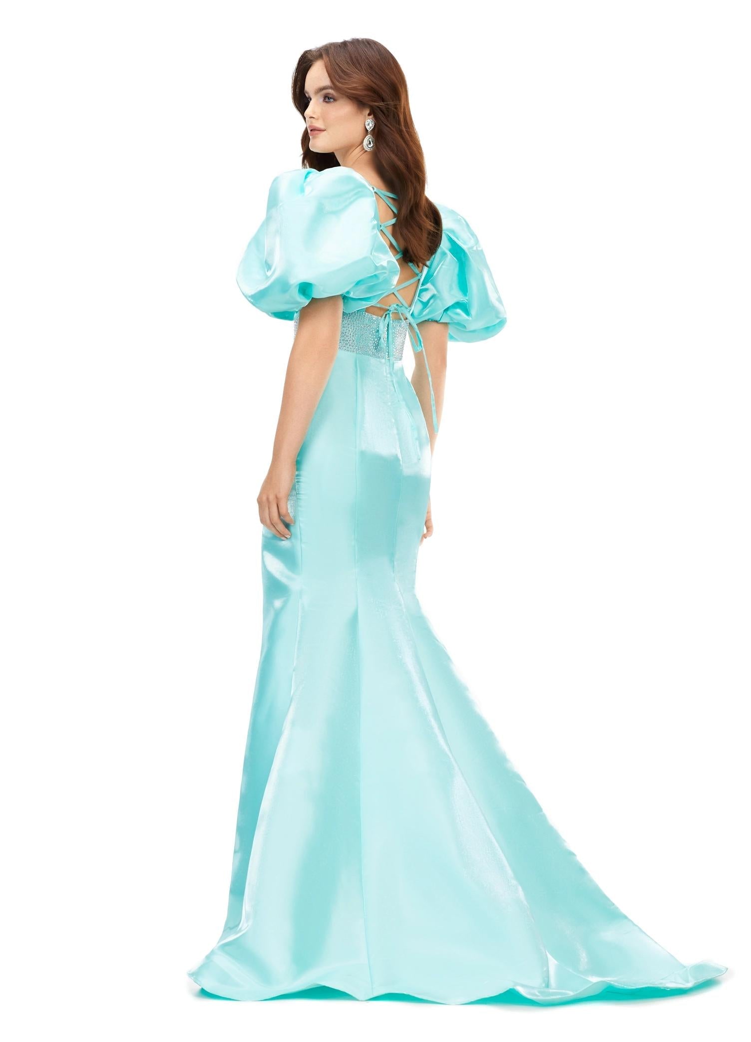 Back. Aqua ASHLEYlauren 11379 Shimmer Satin Fitted Gown with V-Neckline, Lace-Up Back, Oversized Puff Sleeves, and Scattered Heat Set Stone Waistband