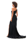 Back. Black ASHLEYlauren 11337 One Shoulder Fitted Jersey Gown Embellished with Heat Set Stones, Asymmetrical Shark Bite Cut Out, and Left Leg Slit