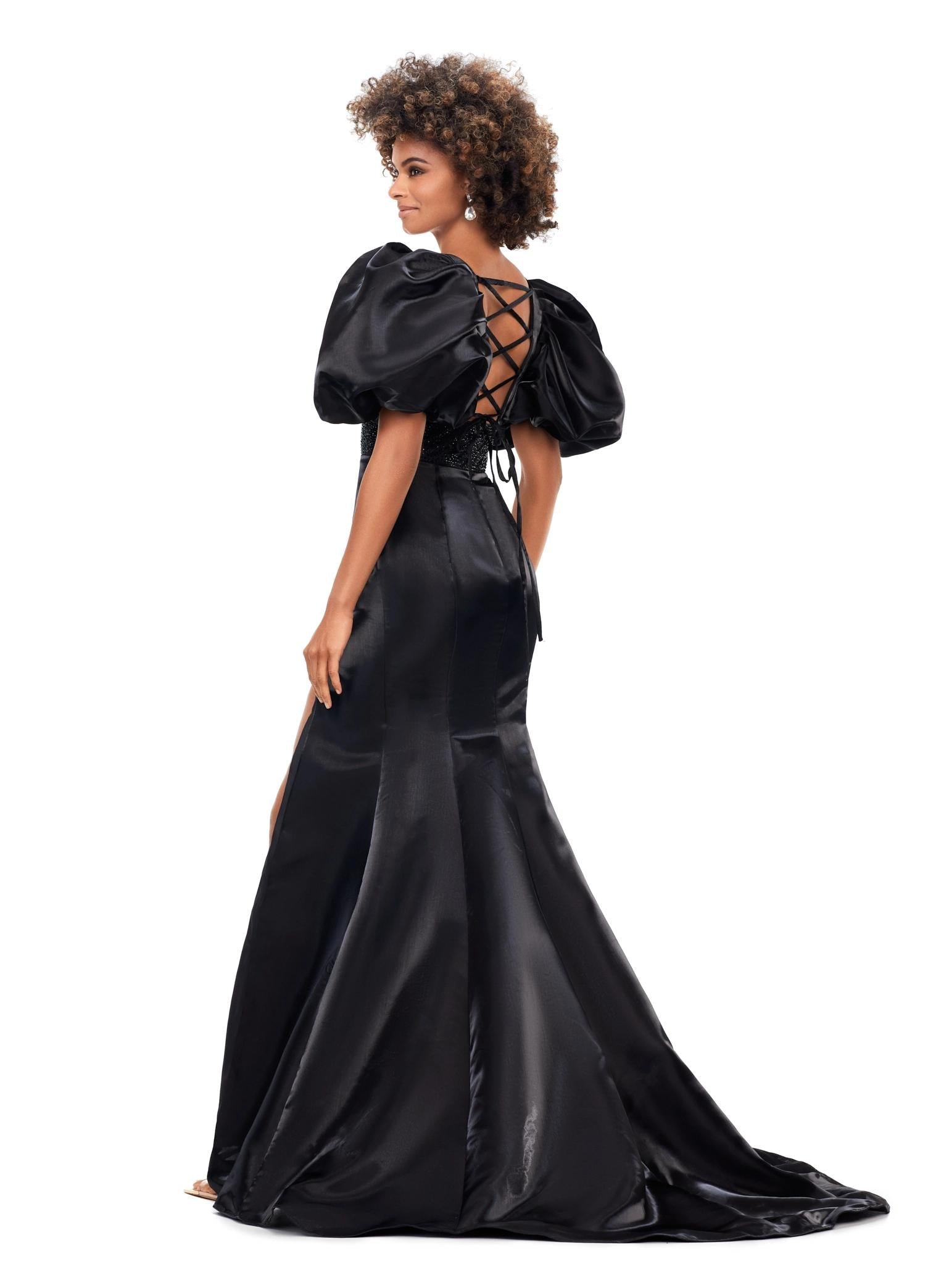 Back. Black ASHLEYlauren 11379 Shimmer Satin Fitted Gown with V-Neckline, Lace-Up Back, Oversized Puff Sleeves, and Scattered Heat Set Stone Waistband