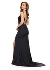 Back. Black ASHLEYlauren 11664 fitted jersey gown featuring a fully beaded corset bustier, spaghetti straps, lace-up back, ruched waist detailing, and a left leg slit for a sleek and glamorous look.