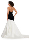 Back. Black/Ivory ASHLEYlauren 11264 show-stopping mermaid gown featuring a deep V-neckline, luxurious velvet bustier, asymmetrical satin flare skirt, and a sweep train for a bold and glamorous statement look.