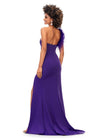 Back. Black Orchid ASHLEYlauren 1129 one shoulder scuba gown featuring feather-embellished neckline, heat set stones cascading down the skirt, and a left leg slit for a bold and elegant look.