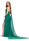 Back. Emerald ASHLEYlauren 11736 glamorous one shoulder gown featuring press-on stone embellishments, a dramatic one shoulder cape, and a left leg slit for an elegant and show-stopping look.