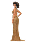 Back. Gold ASHLEYlauren 11366 stunning hand-beaded gown featuring a deep V-neckline, intricate bead pattern, side cut outs, a lace-up open back, and a sweep train for a bold and glamorous statement look.