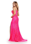 Back. Hot pink ASHLEYlauren 11471 one shoulder stretch sequin gown with illusion side cut out and left leg slit