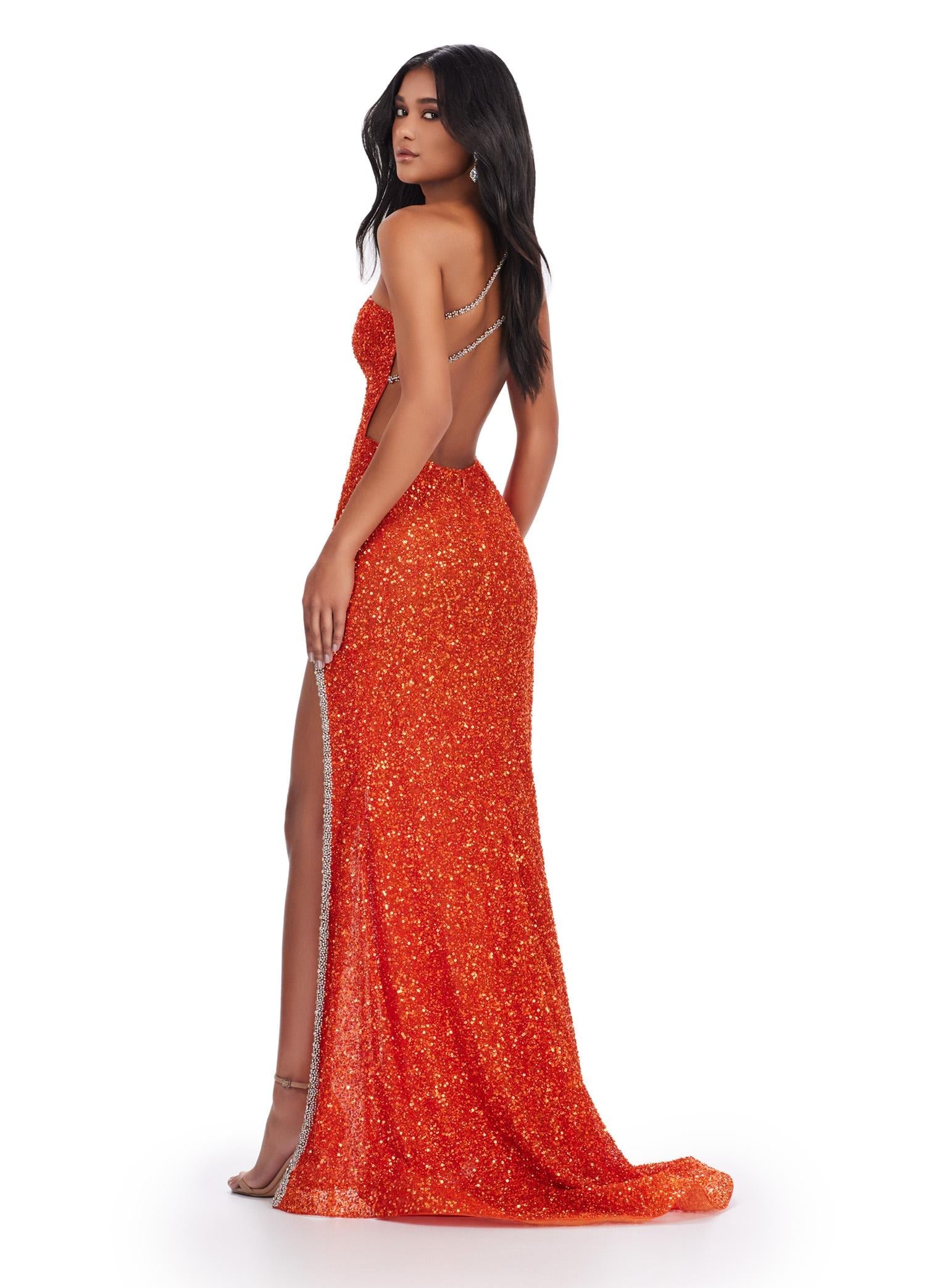 Back view. ASHLEYlauren 11635 One Shoulder Fully Beaded Gown in Orange with Crystal Trimmed Asymmetric Cut Out, Open Back, and Left Leg Slit