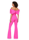 Back. Pink ASHLEYlauren 11414 chic scuba jumpsuit featuring an off shoulder neckline with an oversized bow for a bold and sophisticated statement look.