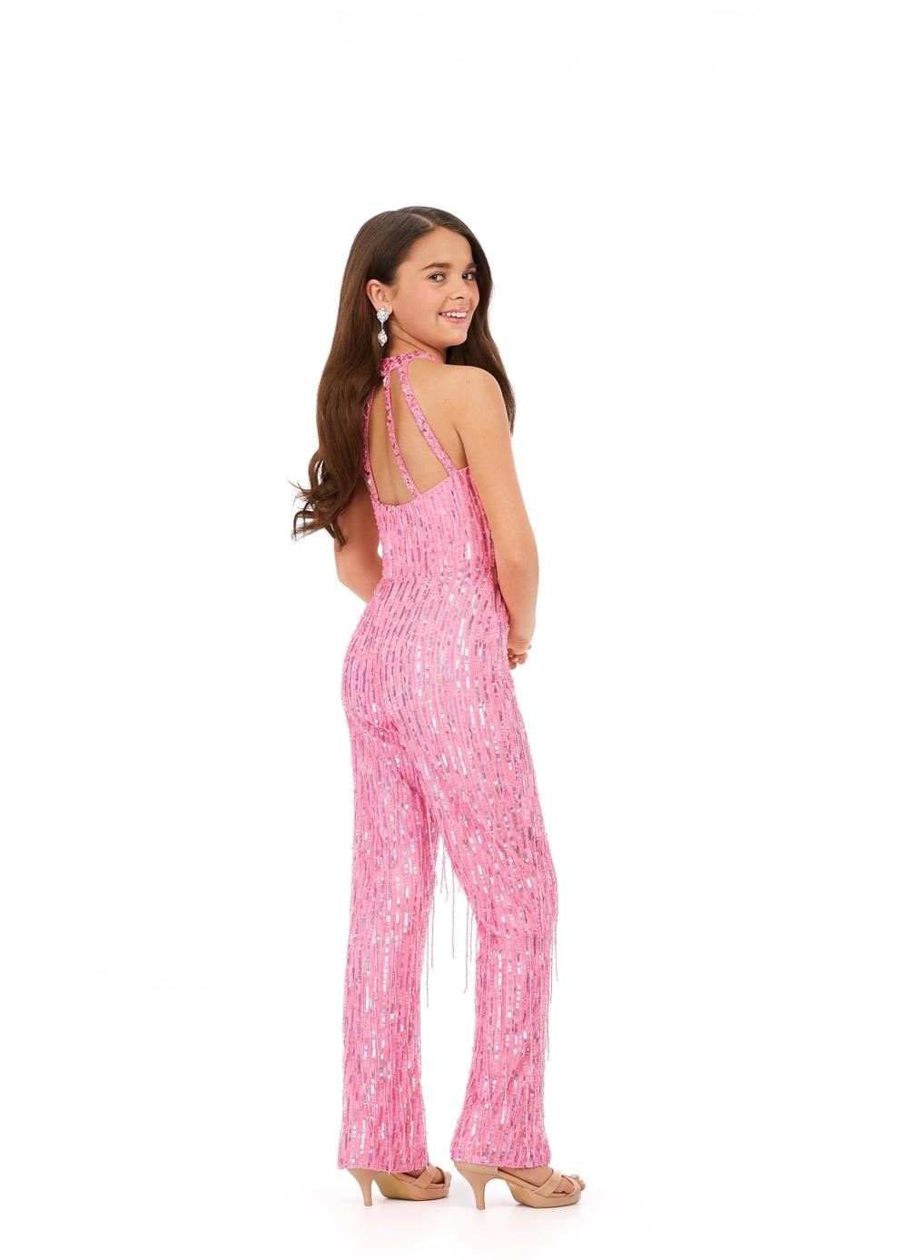 Back. Pink ASHLEYlauren Kids 8194 runway-ready fully beaded jumpsuit featuring a halter neckline and fringe detailing throughout for the perfect amount of movement and glamour.