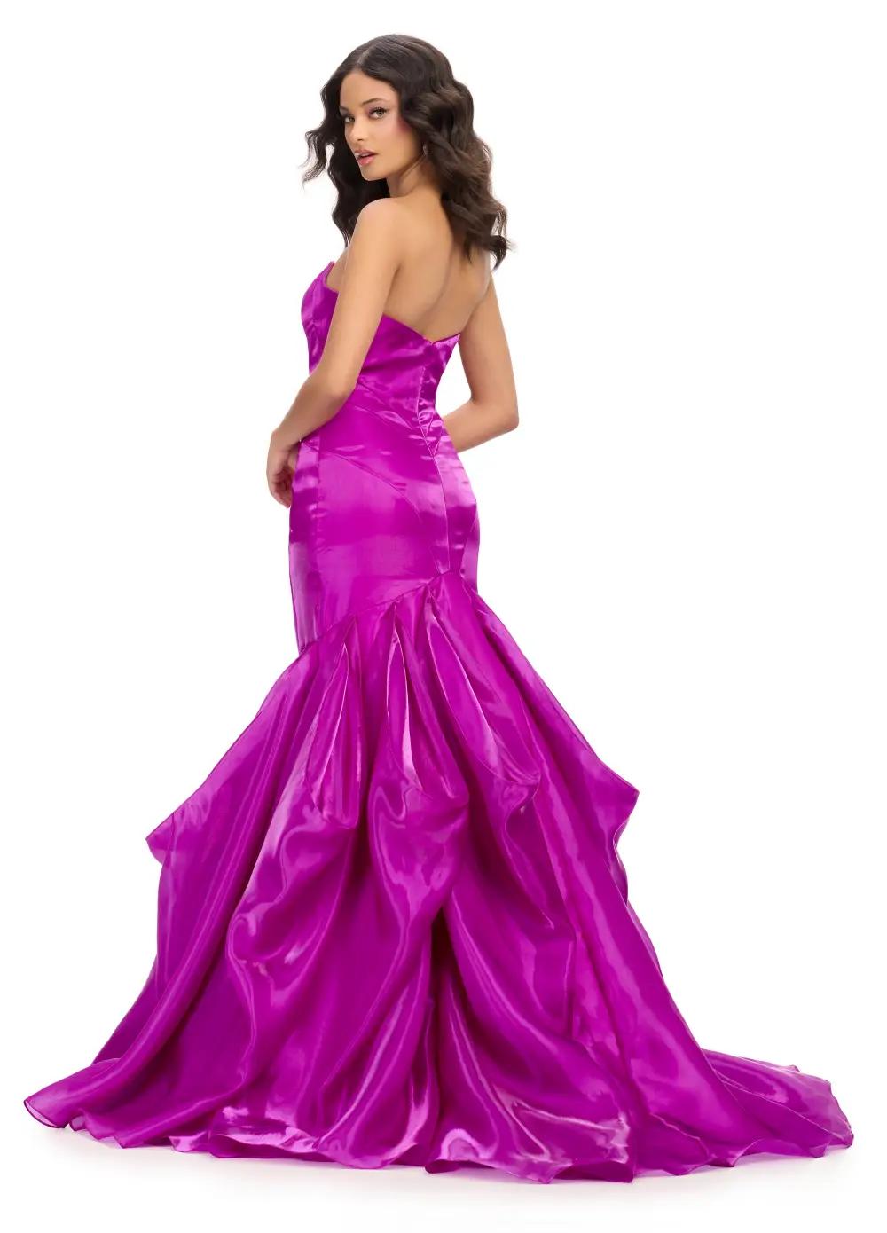 Back. Purple ASHLEYlauren 11733 glamorous strapless gown featuring a sweetheart neckline, shiny organza fabric, fit and flare silhouette, and a dramatic ruffle mermaid skirt for an elegant and show-stopping look.