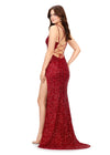Back. Red ASHLEYlauren 11342 sequin gown featuring double spaghetti straps, a sweetheart neckline, lace-up back with beaded fringe tassels, and a left leg slit for a glamorous and elegant look.